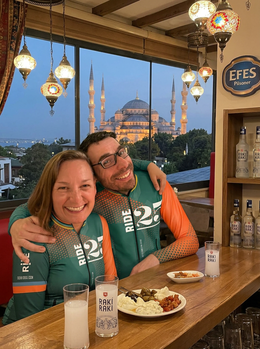 Ride25 riders in jerseys enjoying raki at a bar with the Blue Mosque behind in Istanbul